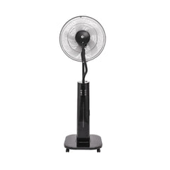 A black pedestal fan with a misting nozzle at the center of the fan's blade assembly, mounted on a circular base with caster wheels for mobility.