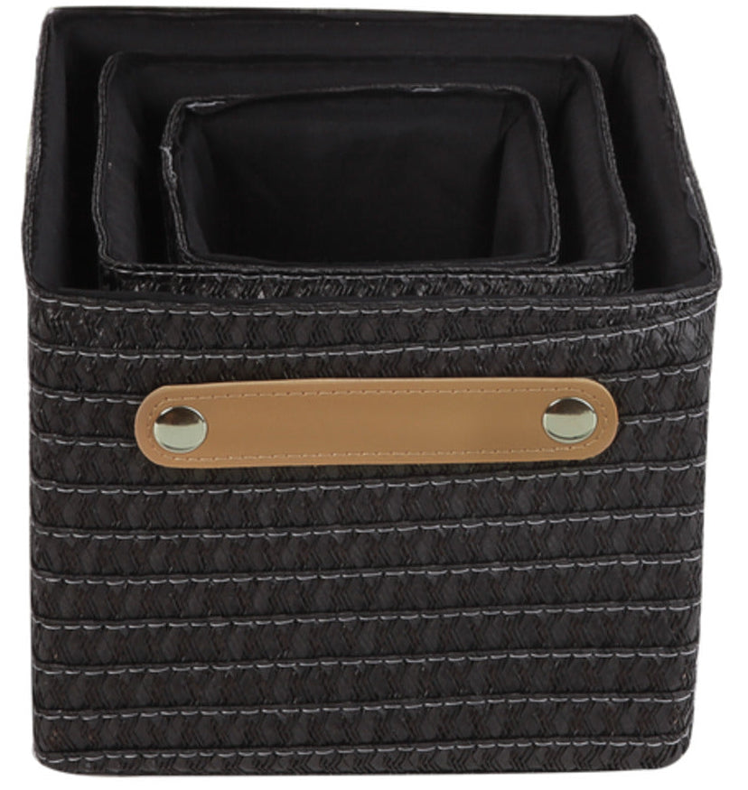 A set of three black Sensea straw baskets with brown handles.