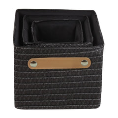 A set of three black Sensea straw baskets with brown handles.
