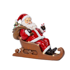 Lumineo BO Led Polyresin Santa on Sleigh 30cm